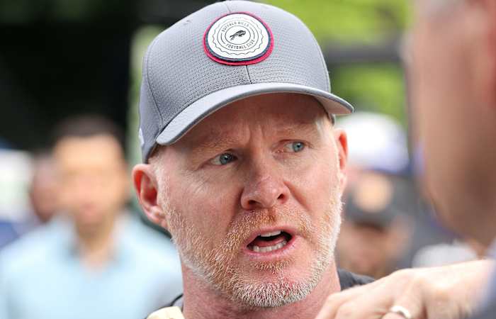 Bills head coach Sean McDermott speaks as player arrives at the site of the Tops shooting. The teams made their presence felt and handed out food to people in the community.