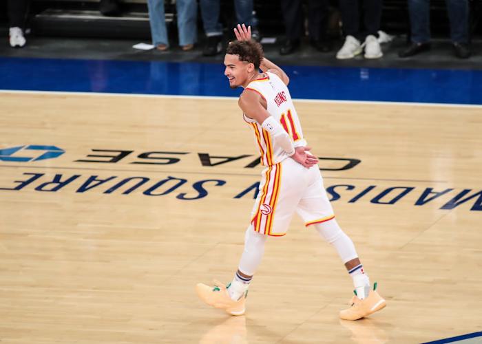 Jun 2, 2021; New York, New York, USA; Atlanta Hawks guard Trae Young (11) waves to the crowd after making a three point shot in against the New York Knicks in the fourth quarter during game five in the first round of the 2021 NBA Playoffs at Madison Square Garden.