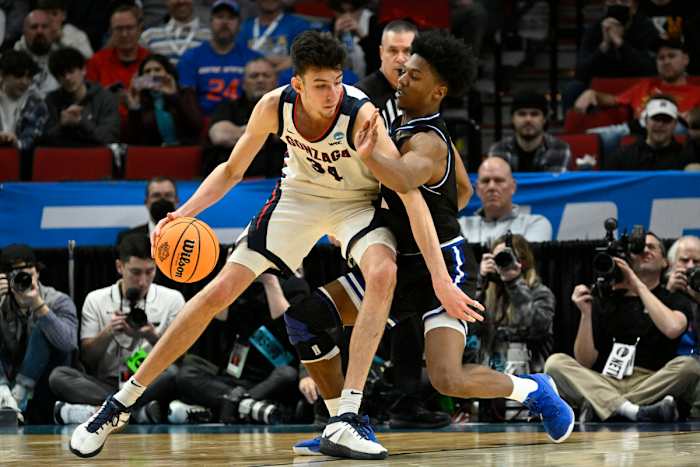 Georgia State Panthers guard Kane Williams (12) defends against Gonzaga Bulldogs center Chet Holmgren (34) in the second half during the first round of the 2022 NCAA Tournament at Moda Center.