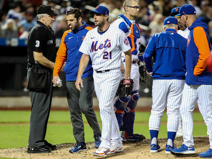 May 18, 2022; New York City, New York, USA; New York Mets starting pitcher Max Scherzer (21) is taken out because of an injury in the sixth inning against the St. Louis Cardinals at Citi Field.