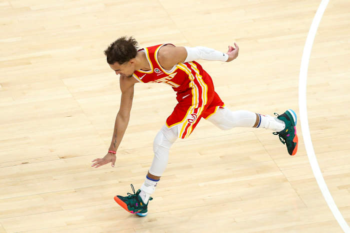 Atlanta Hawks guard Trae Young (11) celebrates a basket against the New York Knicks in the fourth quarter during game three in the first round of the 2021 NBA Playoffs at State Farm Arena.