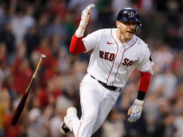 Boston Red Sox’s Trevor Story flips his bat after hitting a grand slam against the Seattle Mariners during the third inning of a baseball game Friday, May 20, 2022, in Boston.