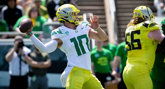 Oregon QB Bo Nix launches a pass in the spring game.
