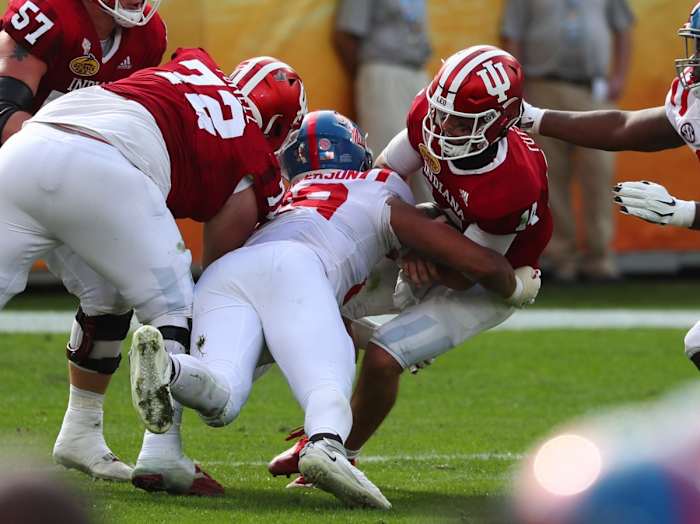 Jan 2, 2021; Tampa, FL, USA; Mississippi Rebels defensive lineman Ryder Anderson (89) sacks Indiana Hoosiers quarterback Jack Tuttle (14) during the first half at Raymond James Stadium.