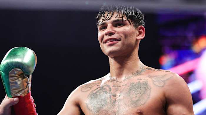 Ryan Garcia celebrates defeating Emmanuel Tagoe in their Lightweight bout at the Alamodome on April 09, 2022 in San Antonio, Texas.