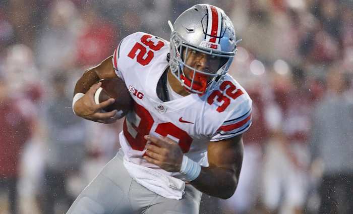 Ohio State Buckeyes running back TreVeyon Henderson on a run during a college football game in the Big Ten.