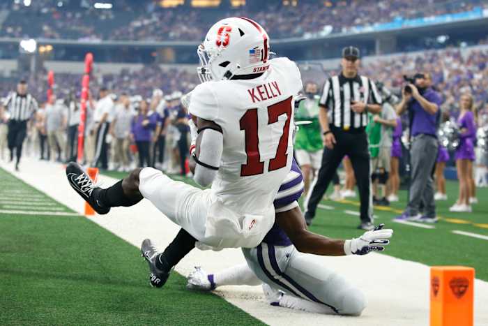 Stanford Cardinal cornerback Kyu Blu Kelly (17) makes an interception against Kansas State Wildcats wide receiver Phillip Brooks (88) in the first quarter at AT&T Stadium.