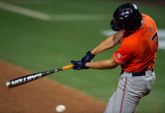 Auburn Tigers infielder Cole Foster (7) swings at the ball during the NCAA regional baseball tournament at Plainsman Park in Auburn, Ala., on Saturday, June 4, 2022. Auburn Tigers defeated Florida State Seminoles 21-7.
