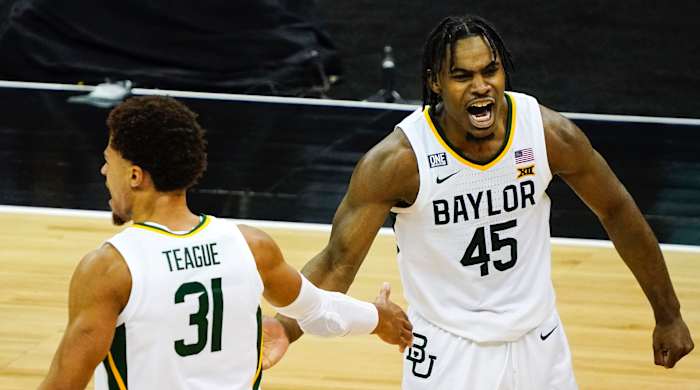 Baylor Bears guard Davion Mitchell (45) celebrates with guard MaCio Teague (31)