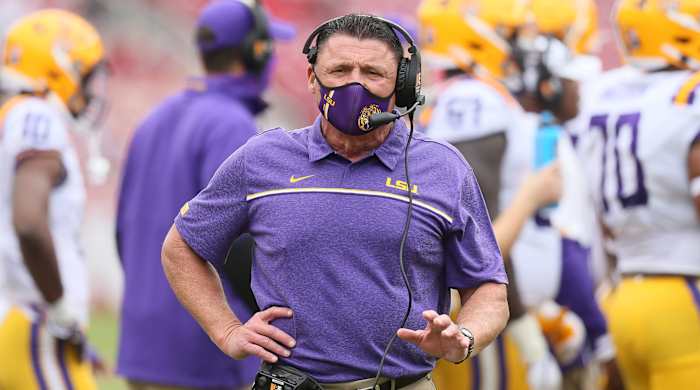 Nov 21, 2020; Fayetteville, Arkansas, USA; LSU Tigers head coach Ed Orgeron looks on during the first half against the Arkansas Razorbacks at Donald W. Reynolds Razorback Stadium.