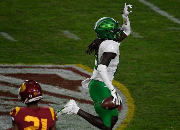 Jamal Hill celebrates one of his two interceptions against USC in the 2020 Pac-12 Championship Game.
