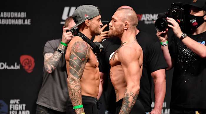 Conor McGregor and Dustin Poirier during the UFC 257 weigh-in.