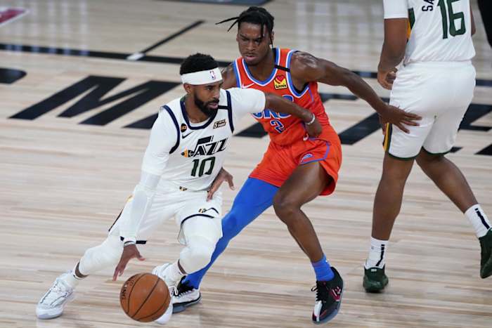 Mike Conley (10) drives through the lane against the Oklahoma City Thunder