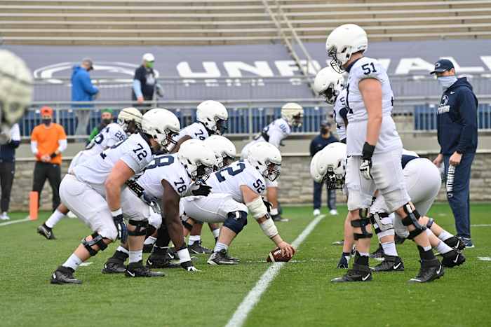 Offensive line with coach Phil Trautwein (right)