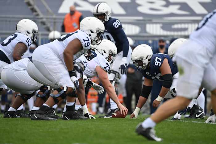 Scrimmage action, featuring center Mike Miranda (73) and tackles Rasheed Walker (53) and Caedan Wallace (79)