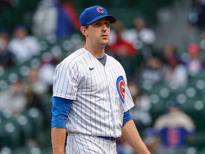 Kyle Hendricks leaves the mound after giving up four home runs against the Braves in the first inning.