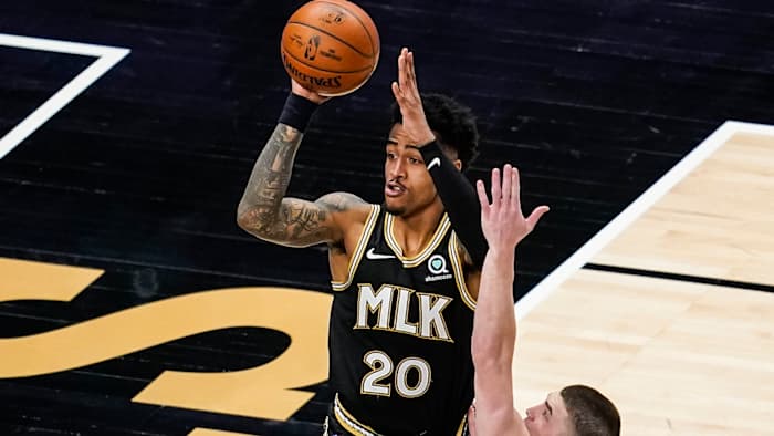 John Collins of the Hawks attempts shot