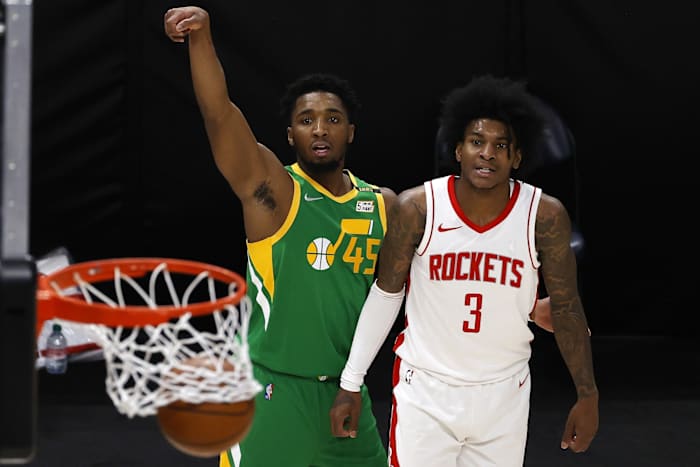 Donovan Mitchell (45) drills a three pointer against the Houston Rockets