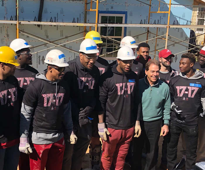 Nick Saban and Alabama players work on national championship house No. 17