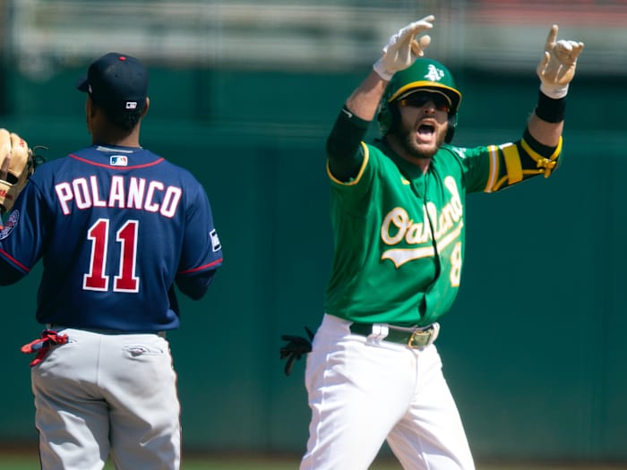 Oakland Athletics Jed Lowrie (8) celebrates his two-run double