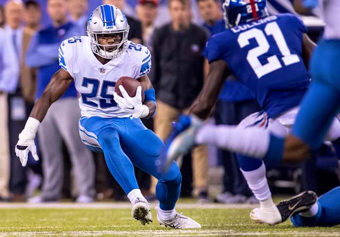 Lions running back Theo Riddick runs against the Giants