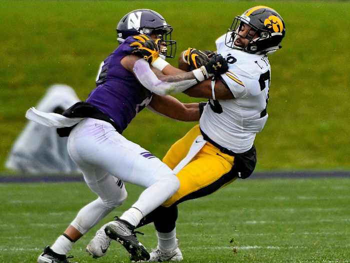 Northwestern's Greg Newsome II defends vs. Iowa
