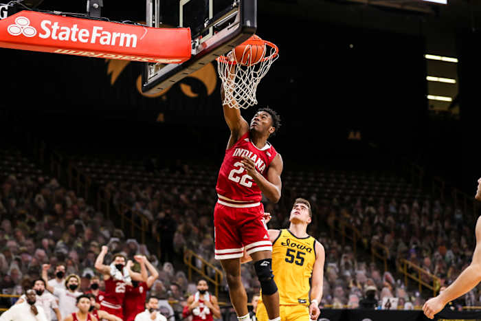 Indiana freshman Jordan Geronimo (22) dunks while Iowa All-American Luka Garza looks on during the Hoosiers' upset of No. 4 Iowa on Jan. 21, 2021. (USA TODAY Sports)