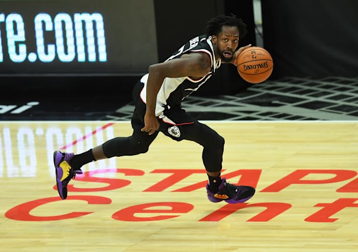Feb 19, 2021; Los Angeles, California, USA; Los Angeles Clippers guard Patrick Beverley (21) takes the ball down court in the first half of the game against the Utah Jazz at Staples Center. Mandatory Credit: Jayne Kamin-Oncea-USA TODAY Sports