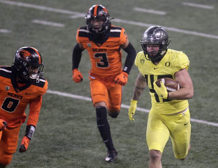 Hunter Kampmoyer (48) runs against Oregon State in a regular season game at Reser Stadium in Corvallis, Oregon, on November 28, 2020.