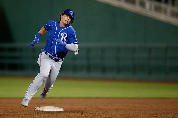 Kansas City Royals Bobby Witt Jr., rounds the bases on an error, inside the park home run, which was misplayed by Cincinnati Reds left fielder Errol Robinson in the eighth inning of the MLB Cactus League Spring Training game between the Cincinnati Reds and the Kansas City Royals at Goodyear Ballpark in Goodyear, Ariz., on Thursday, March 4, 2021. The Royals won 5-3 in a nine-inning game. Kansas City Royals At Cincinnati Reds Spring Training