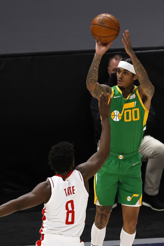 Jordan Clarkson (00) drills a three pointer against the Houston Rockets