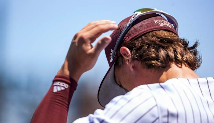 Mississippi State's Tanner Leggett adjusts his hat this past weekend against Missouri. The Bulldogs lost two out of three games to the Tigers and as a result, dropped a few spots in this week's national rankings. (Photo courtesy of Mississippi State athletics)