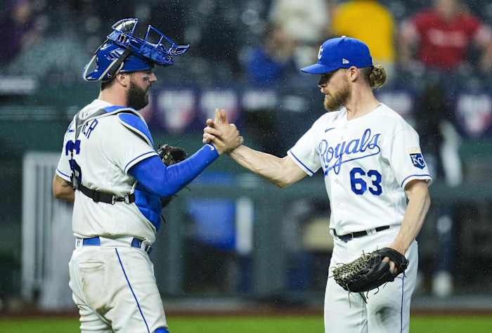 May 19, 2021; Kansas City, Missouri, USA; Kansas City Royals relief pitcher Josh Staumont (63) celebrates with catcher Cam Gallagher (36) after defeating the Milwaukee Brewers at Kauffman Stadium. Mandatory Credit: Jay Biggerstaff-USA TODAY Sports