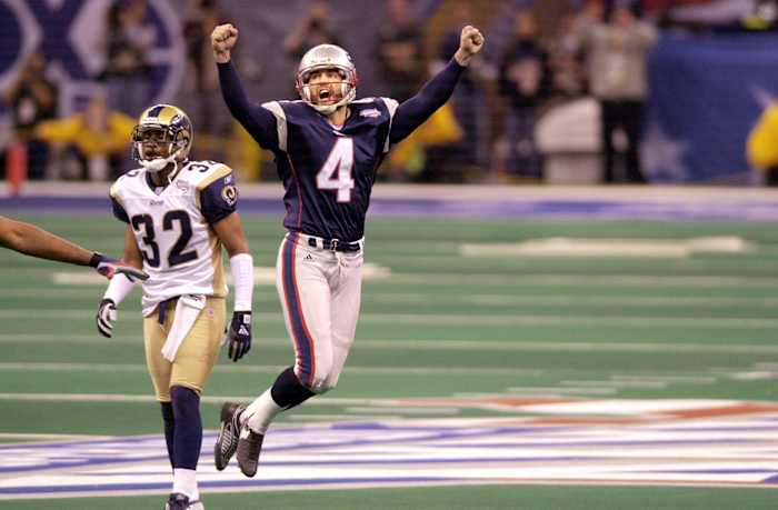 Adam Vinatieri celebrates the game-winning field goal of Super Bowl XXXVI