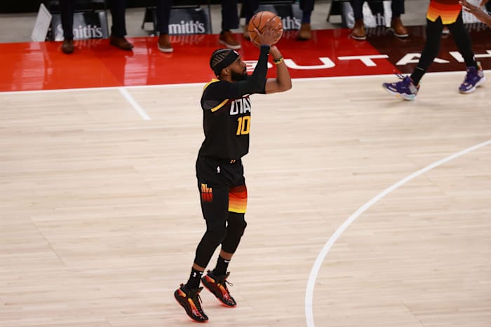 Mike Conley (10) hits a three pointer in the first half of game five