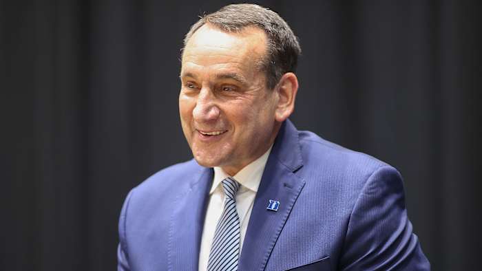 Coach K smiles during his retirement presser
