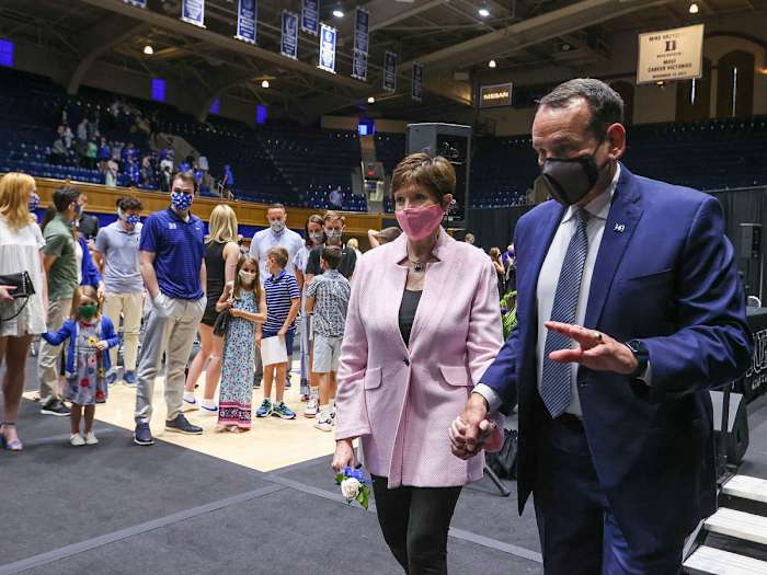 Coach K and his wife, Mickie, leave Thursday's press conference