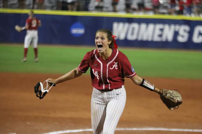 Montana Fouts celebrates a perfect game against UCLA in the WCWS on June 4, 2021.