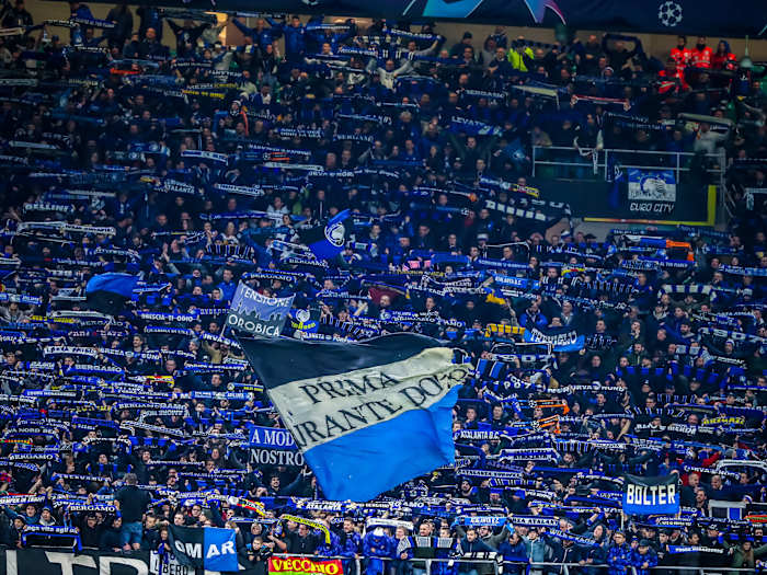 Atalanta BC supporters celebrate the victory during the Champions League 2019/20 match between Atalanta BC vs Valencia CF at the San Siro Stadium, Milan, Italy on February 19, 2020.