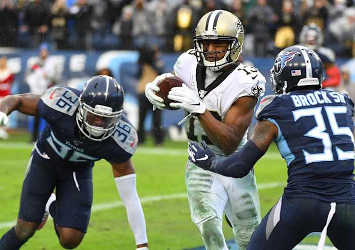New Orleans receiver Michael Thomas (13) breaks the record for receptions in a season with this touchdown reception against the Tennessee Titans. Mandatory Credit: Christopher Hanewinckel-USA TODAY