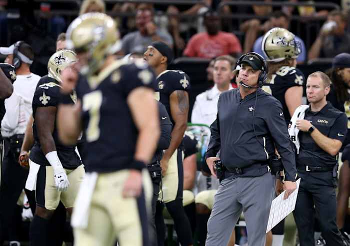 New Orleans Saints head coach Sean Payton looks at quarterback Taysom Hill (7) against the Arizona Cardinals. Mandatory Credit: Chuck Cook-USA TODAY Sports