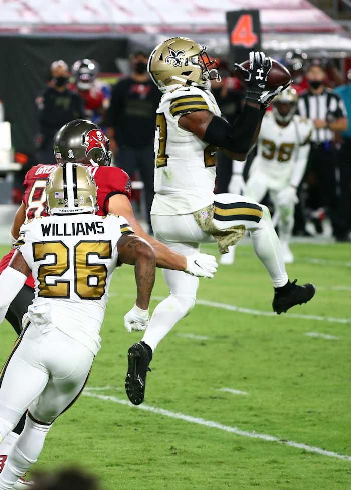 New Orleans Saints strong safety Malcolm Jenkins (27) intercepts the ball against the Tampa Bay Buccaneers. Mandatory Credit: Kim Klement-USA TODAY