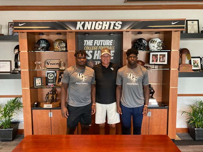 Tavaras Capers and Daylen Russell with Gus Malzahn