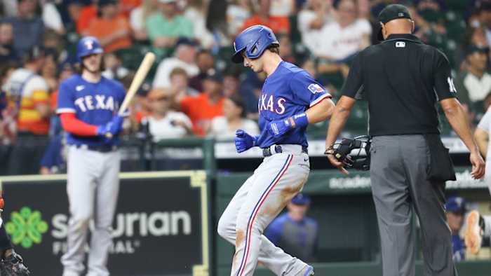 Jun 16, 2021; Houston, Texas, USA;Texas Rangers shortstop Eli White (41) rounds the bases after hitting a home run against the Houston Astros in the seventh inning at Minute Maid Park.