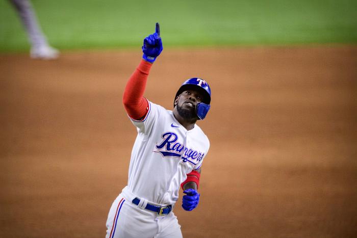 Jun 23, 2021; Arlington, Texas, USA; Texas Rangers center fielder Adolis Garcia (53) celebrates hitting a home run against the Oakland Athletics during the sixth inning at Globe Life Field.