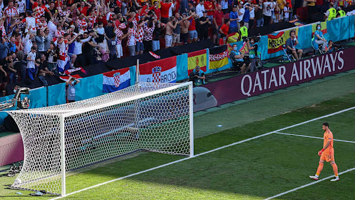 Spain goalkeeper Unai Simon walks back to his net after an own goal vs Croatia at Euro 2020