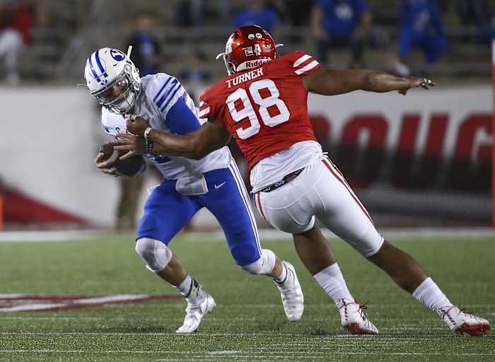 Brigham Young quarterback Zach Wilson (1) is sacked by Houston Cougars defensive lineman Payton Turner (98). Mandatory Credit: Troy Taormina-USA TODAY