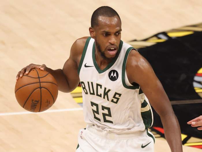Milwaukee Bucks forward Khris Middleton (22) dribbles the ball
