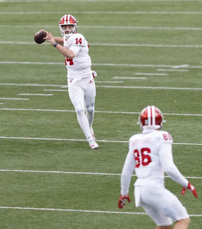 Indiana quarterback Jack Tuttle (14) throws a pass to tight end Peyton Hendershot (86) against Wisconsin. (Jeff Hanisch-USA TODAY Sports)