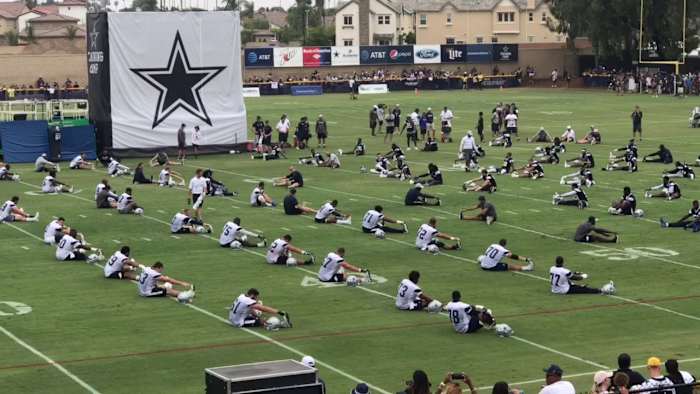 cowboys-stretching-at-camp